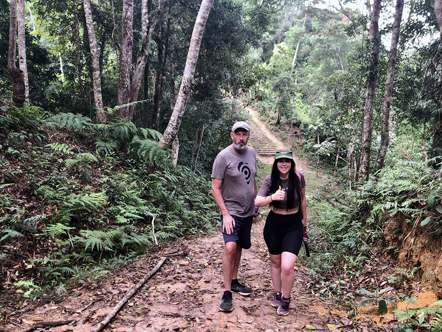 A group of hikers on a guided historical tour of Hamburger Hill.